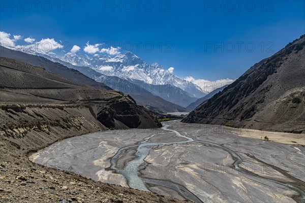 Huge riverbed before the Annapurna mountain range, Kingdom of Mustang, Nepal, Asia