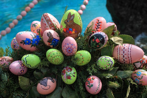 Detail of an Easter fountain in Franconian Switzerland, Bamberg district, Upper Franconia, Germany, many colourful blown-out and dyed eggs as decoration, Easter custom, Europe