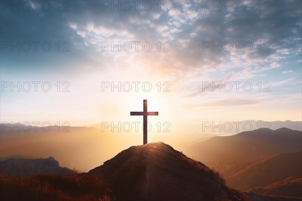 Silhouette of religious Christian cross on mountain top illuminated with sunlight. KI generiert, generiert AI generated
