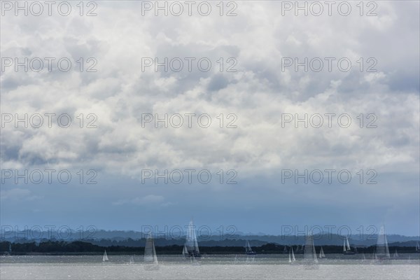 Sailboats on the lake in cloudy sky, double exposure, blurred, motion, long exposure, art, abstract, artistic, water sports, sailing, leisure, travel, holiday, boat, sky, panorama, recreation, nature, nautical, seafaring, horizon, water, freshwater, Masuria, Poland, Europe