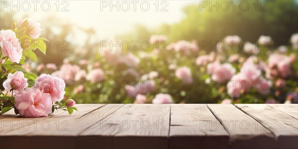 Banner with wooden empty table with pink flowers and blurry garden background. KI generiert, generiert AI generated