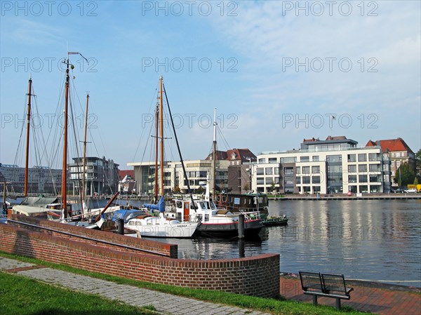 Boats, bench, Emden harbour, East Frisia, Germany, Europe