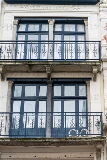 Historic facade with blue balconies and white window frames, built in 1898, Blankenberge, Flanders, Belgium, Europe