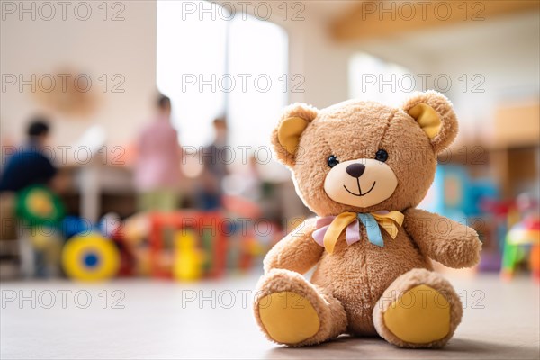 Cute teddy bear child's toy with blurry children kindergarden daycare scene in background. KI generiert, generiert AI generated