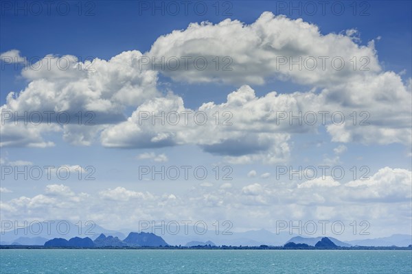 Island world near Surat Thani during ferry trip to Koh Samui, cloud, sky, blue sky, water, sea, boat trip, asian, summer, ocean, holiday, travel, tourism, far, wide, panorama, boat trip, sea trip, ferry, exotic, landscape, seascape, natural landscape, calm, longing, blue, green, weather, cloudy, island, Thailand, Asia