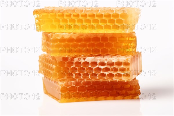 Stack of honeycombs on white background. KI generiert, generiert AI generated