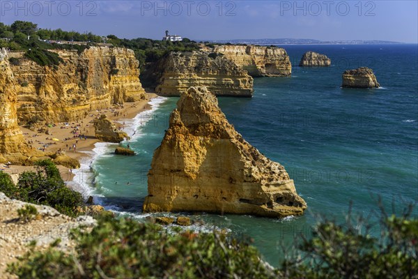 Beach, beach area in the Algarve, summer holiday, weather, sunny, Atlantic, beach, beach holiday, summer holiday, travel, holiday, tourism, nature, rocky, rocks, landscape, coastal landscape, rocky coast, cliffs, bay, bay of the sea, sea, Carvoeiro, Portugal, Europe