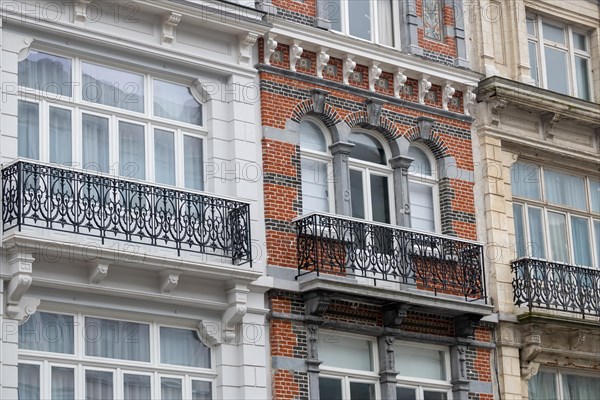 Detailed view of a classically designed brick facade with white window frames, Blankenberge, Flanders, Belgium, Europe