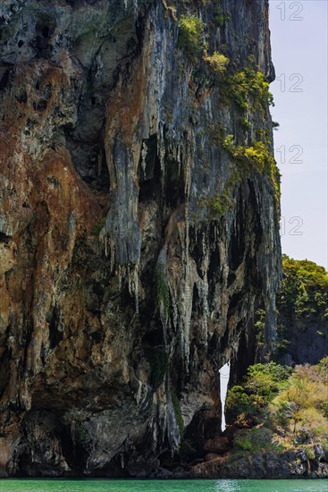 Limestone rocks at Tam Phra Nang beach, limestone, limestone rocks, travel, holiday, tourism, nature, natural landscape, Andaman Sea, climbing rocks, paddling, outdoor, active holiday, travel form, mountain, rock, rock, bizarre, sun, sunny, tropical, tropical, lagoon, sea, ocean, Asian, landscape, Krabi, Thailand, Asia