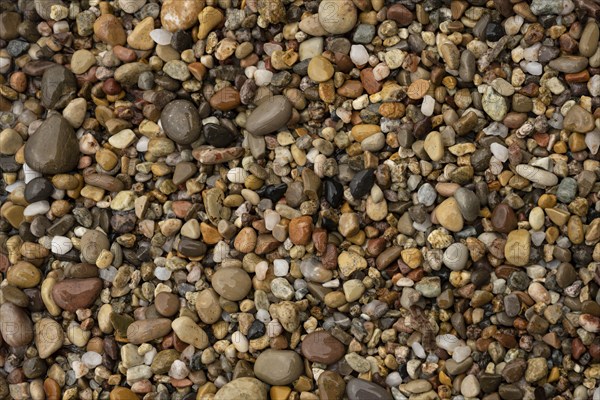 Colourful stones on the beach of Malolo, Milos, Cyclades, Greece, Europe