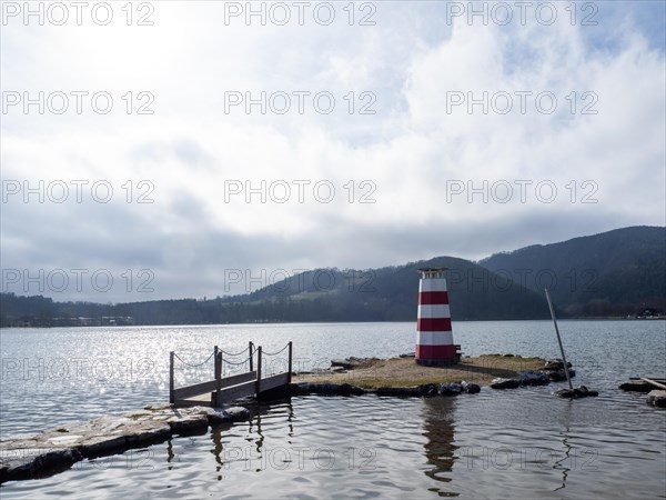 Cloudy sky, lighthouse at the Stubenbergsee, Stubenberg am See, Styria, Austria, Europe