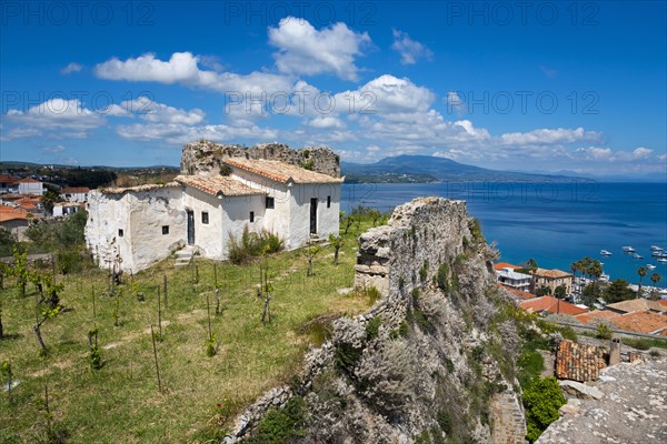 A ruin on a cliff overlooking the sea and surrounding vegetation, Byzantine fortress, old town and harbour, Koroni, Pylos-Nestor, Messinia, Peloponnese, Greece, Europe