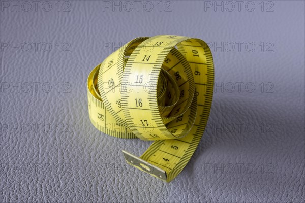 Yellow tape measure, roll