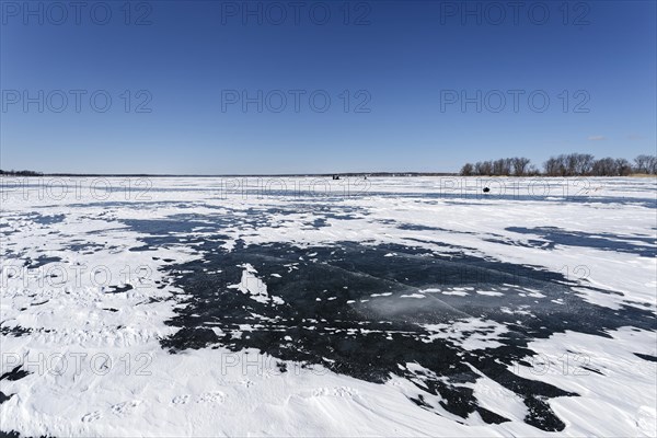 Winter, snow drifts on frozen riverscape, Saint Lawrence River, Province of Quebec, Canada, North America