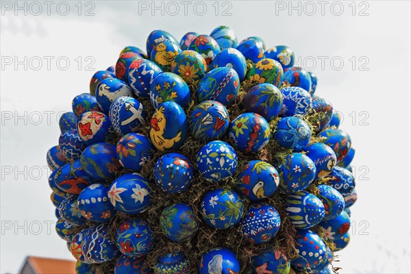 Detail of an Easter fountain in Franconian Switzerland, Bamberg district, Upper Franconia, Germany, many colourful blown-out and dyed eggs as decoration, Easter custom, Europe