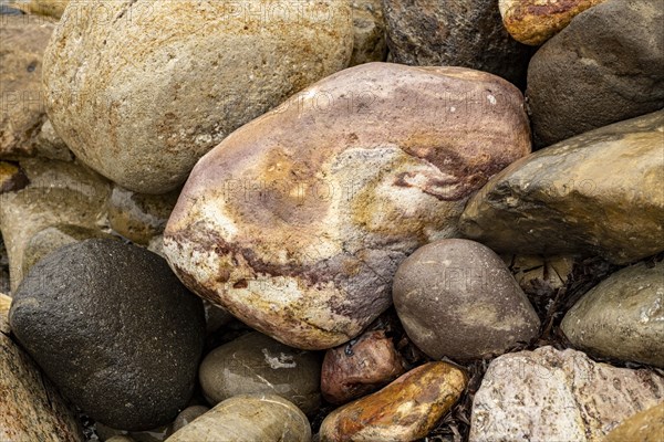 Colourful stones on the beach of Malolo, Milos, Cyclades, Greece, Europe