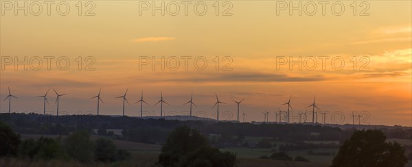 Wind turbines in the sunset, Schoenberg, Mecklenburg-Vorpommern, Germany, Europe