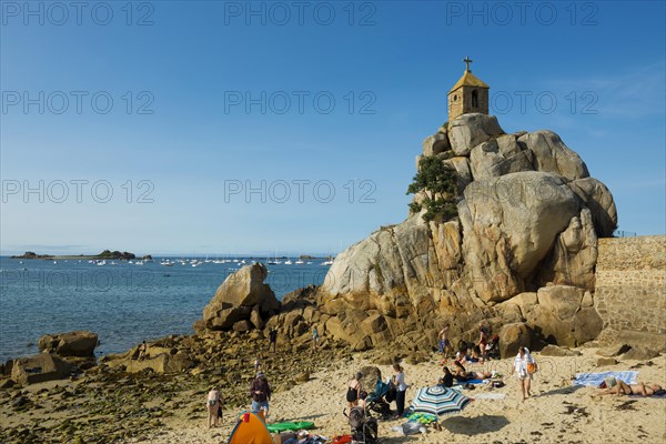 Beach and chapel on rocks, Port Blanc, Cote de Granit Rose, Cotes d'Armor, Brittany, France, Europe