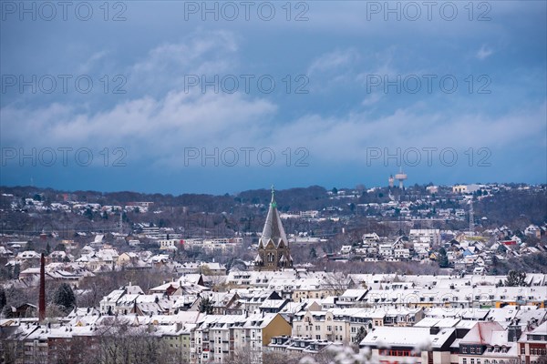 View of a snow-covered town with church and roofs under a grey sky, Nordstadt, Elberfeld, Wuppertal, Bergisches Land, North Rhine-Westphalia