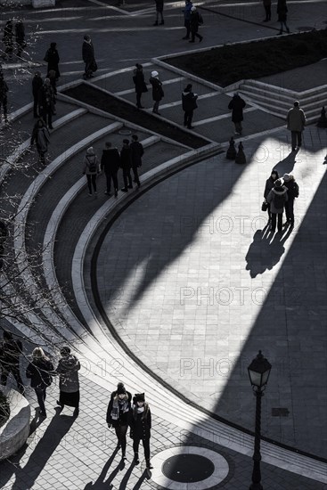 Sunlight floods the inner courtyard of the Fisherman's Bastion, travel, city trip, tourism, light, shadow, silhouettes, Eastern Europe, capital, Budapest, Hungary, Europe