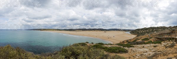 Coastal section at the southern Algarve, panorama, nature, rocky coast, beach, beach section, bay, sea bay, overview, tourism, journey, holiday, beach walk, landscape, beach landscape, natural landscape, nobody, empty, summer, cloudy, Atlantic, Atlantic Ocean, stairs, wooden walkway, national park, Carrapateiera, Portugal, Europe