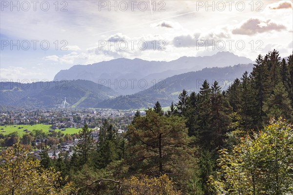 Wetterstein mountains with forest in autumn, hiking trail Kramerplateauweg, Garmisch-Partenkirchen, Upper Bavaria, Bavaria, Germany, Europe