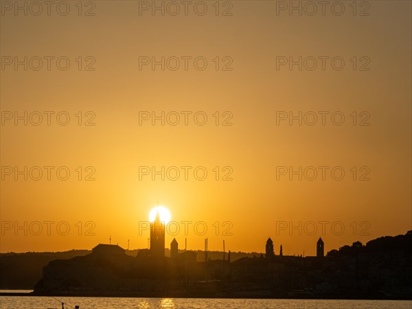 Sunset, silhouette of the church towers of Rab, town of Rab, island of Rab, Kvarner Gulf Bay, Croatia, Europe