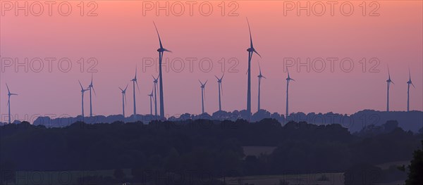 Wind turbines in the sunset, Schoenberg, Mecklenburg-Vorpommern, Germany, Europe