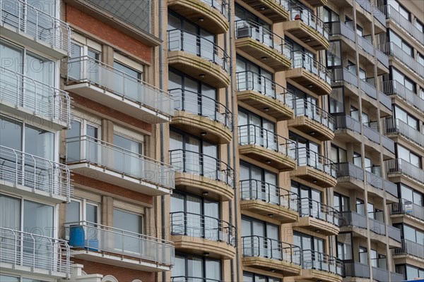 Close-up of a multi-storey building with balconies and brick facade, Blankenberge, Flanders, Belgium, Europe