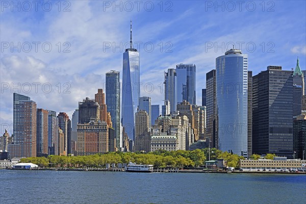 Skyline with skyscrapers in the Financial District, Battery Park in the foreground, One World Trade Centre or Freedom Tower, Hudson River, Lower Manhattan, New York City, New York, USA, North America
