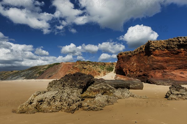 Algarve beach, wide, red rock, rocky coast, nobody, clear, blue sky, cloud, summer holiday, beach holiday, sea, ocean, Atlantic, Atlantic Ocean, sandy beach, coast, Atlantic coast, national park, geography, climate, travel, neutral, empty, sun, nature, natural landscape, beach landscape, surfer beach, Aljezur, Carrapateira, Sagres, Portugal, Europe