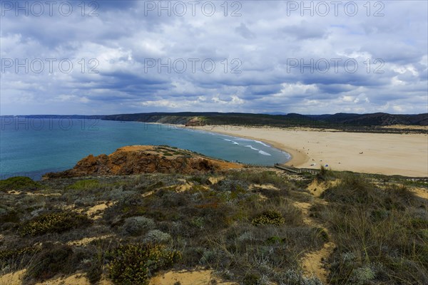 Coastal section at the southern Algarve, panorama, nature, rocky coast, beach, beach section, bay, sea bay, overview, tourism, journey, holiday, beach walk, landscape, beach landscape, natural landscape, nobody, empty, summer, cloudy, Atlantic, Atlantic Ocean, Carrapateiera, Portugal, Europe