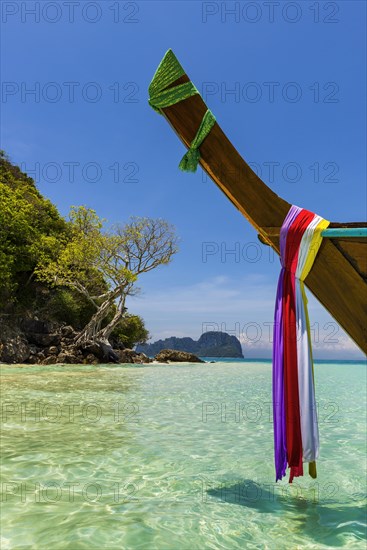 Bamboo, island, boat, wooden boat, longtail boat, bay, bay, sea, ocean, Andaman Sea, tropics, tropical, island, rock, rock, water, tradition, faith, decorated, beach, beach holiday, environment, clear, clean, peaceful, picturesque, sea level, climate, fishing boat, travel, tourism, natural landscape, paradisiacal, beach holiday, sun, sunny, holiday, dream trip, holiday paradise, paradise, coastal landscape, nature, idyllic, turquoise, Siam, exotic, travel photo, cloth, colourful, tree, sandy beach, Thailand, Asia