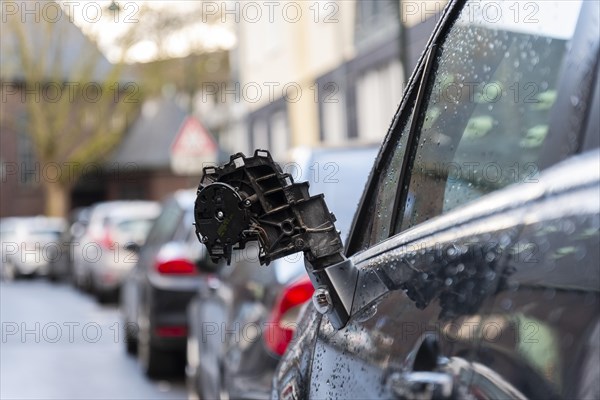 Torn off side mirror after an accident with a car that was parked on the side of the road, Duesseldorf, Germany, Europe