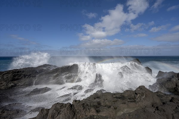 Surf with rainbow, near Los Hervideros, Lanzarote, Canary Islands, Spain, Europe