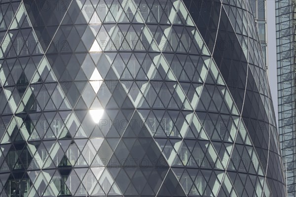 The Gherkin skyscraper building close up of window details, City of London, England, United Kingdom, Europe