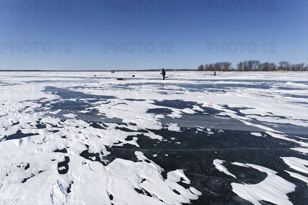 Winter, snow drifts on frozen riverscape, Saint Lawrence River, Province of Quebec, Canada, North America