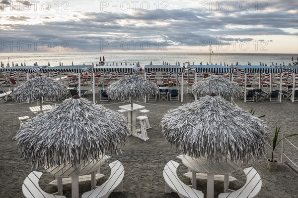 Empty beach and beach loungers, sunrise, Spotorno, Riviera di Ponente, Liguria, Italy, Europe