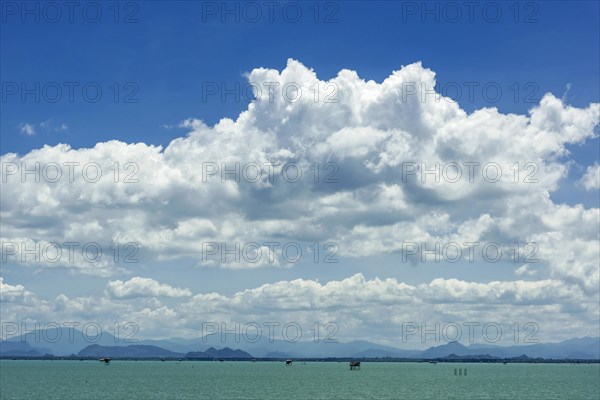 Island world near Surat Thani during ferry trip to Koh Samui, cloud, sky, blue sky, water, sea, boat trip, asian, summer, ocean, holiday, travel, tourism, far, wide, panorama, boat trip, sea trip, ferry, exotic, landscape, seascape, natural landscape, calm, longing, blue, green, weather, cloudy, island, Thailand, Asia