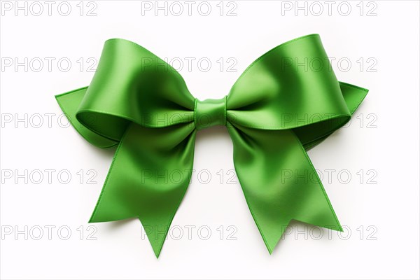 Green silk ribbon on white bakcground. KI generiert, generiert AI generated