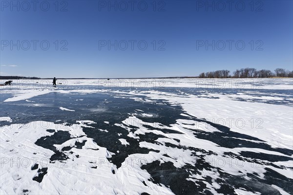 Winter, snow drifts on frozen riverscape, Saint Lawrence River, Province of Quebec, Canada, North America