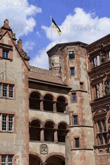 Detailed view of a historical building (Heidelberg Castle), with flag and arched windows, Heidelberg, Baden-Wuerttemberg, Germany, Europe