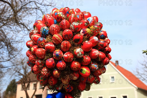 Detail of an Easter fountain in Franconian Switzerland, Bamberg district, Upper Franconia, Germany, many colourful blown-out and dyed eggs as decoration, Easter custom, Europe