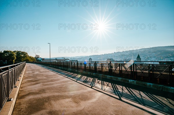 Morning atmosphere on an empty bridge with a view of the city in the warm sunlight, cycle path, Nordbahntrasse, Barmen, Wuppertal, Bergisches Land, North Rhine-Westphalia