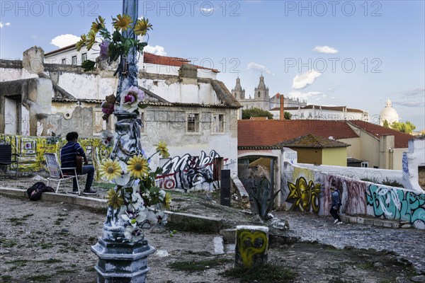 Musician overlooking Alfama, city view, tourism, travel, city trip, urban, building, historical, old town, centre, overview, cathedral, church, attraction, famous, viewpoint, street musician, scene, colourful, graffiti, summer holiday, capital, Lisbon, Portugal, Europe