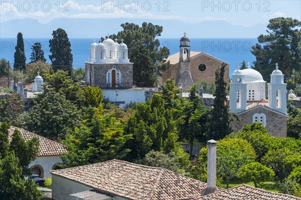 View of a town with churches and sea in the background, Nunnery, Holy Monastery of Timi Prodromos, Byzantine fortress, Koroni, Pylos-Nestor, Messinia, Peloponnese, Greece, Europe
