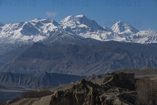 Old palace, dzong in the village of Tsarang before the Annapurna mountain range, Kingdom of Mustang, Nepal, Asia