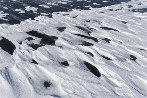 Winter, snow drifts on frozen riverscape, Saint Lawrence River, Province of Quebec, Canada, North America