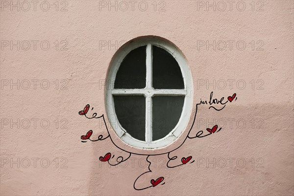 Street art, painted house wall with hearts and lettering on the theme of love, Montmartre, Paris, Ile-de-France, France, Europe