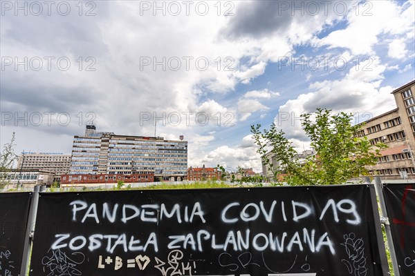 Katowice, Poland, July 11, 2022: photo of graffiti saying The pandemic of covid-19 was planned, Europe